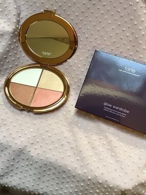 TARTE highlighter palette. Sheer shades of white, gold, pink and bronze.